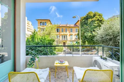 a balcony with a view of a building at Charmant 2P au cœur de Nice in Nice