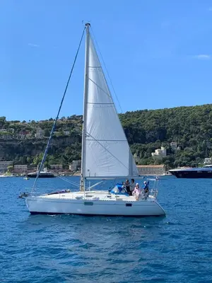 a group of people on a sailboat in the water at Riviera-King-Studio in Villefranche-sur-Mer