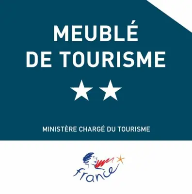 a logo for a module de tourette at Riviera-King-Studio in Villefranche-sur-Mer