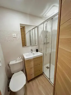 a bathroom with a toilet and a sink and a shower at Studio cosy Nice in Nice