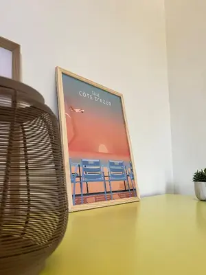 a picture of a picture of chairs on a table at Terrasse, piscine, clim, proche aéroport et plage in Saint-Laurent-du-Var
