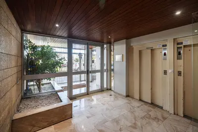 an empty lobby with a large window in a building at Sea View & Promenade des Anglais Studio in Nice