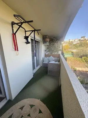 a balcony with a fire hydrant on the wall at Olympie, airport, train and tram station Fully equipped for 3 peoples in Nice