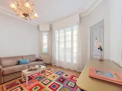 a living room with a couch and a table at Nestor&Jeeves - ORANGE - Central - Near Sea in Nice