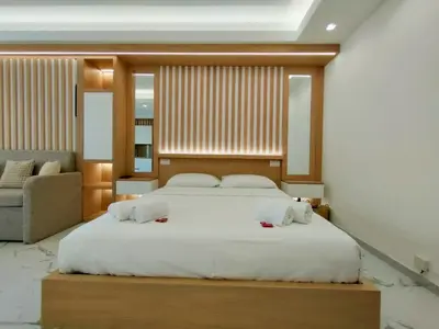 a bedroom with a large bed and a couch at France 105 Super Centrale 2 Pers WiFi AC in Nice