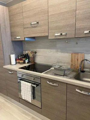 a kitchen with a sink and a stove top oven at Nice Promenade des Anglais Your Seafront Flat in Nice