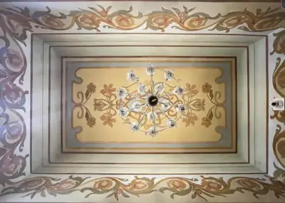 a ceiling with a painting of a chandelier on it at Syrah - Cozy Apartment in Nice