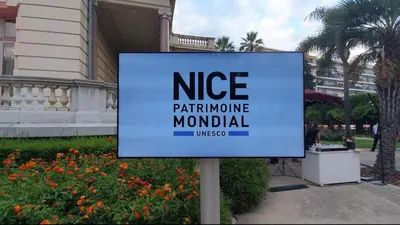 a sign for a nice maintenance manual in front of a house at Syrah - Cozy Apartment in Nice