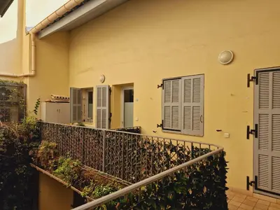 a balcony of a house with a fence at Syrah - Cozy Apartment in Nice
