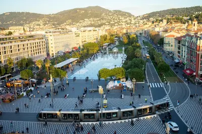 an overhead view of a city with a train on a street at Studio au cœur de Nice lumineux in Nice