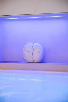 a ball sitting on a shelf in a bowling alley at Studio29 in Nice