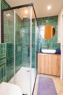 a bathroom with a shower and a sink at Le Jasmin - Au Coeur de Nice in Nice