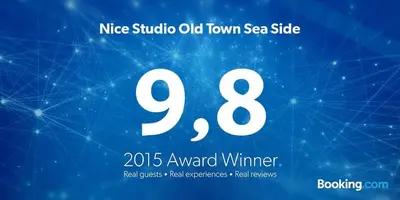 a sign that reads nisse studio old town sea side with a whiteermottermott at Nice Studio Old Town Sea Side in Nice