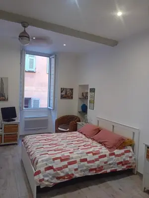 a bedroom with a bed and a window at Nice Studio Old Town Sea Side in Nice