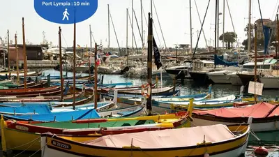 a bunch of boats are docked in a harbor at Cocon charmant et paisible au cœur du Vieux Nice in Nice