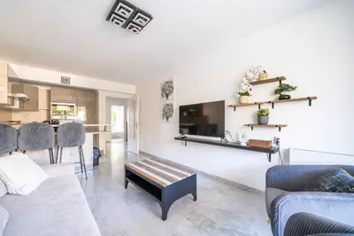a living room with a couch and a table at Superbe 3 pieces Nice 100m de la mer in Nice