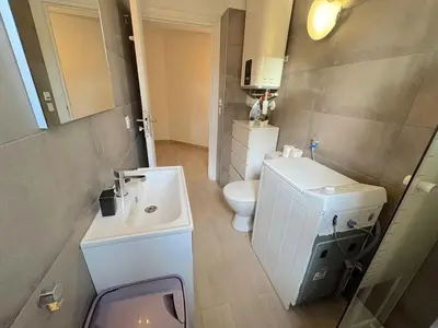 a small bathroom with a sink and a toilet at ⁂ Calme et ensoleillé balcon quartier Port Nice in Nice