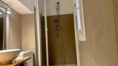 a bathroom with a shower and a sink at ApartHotel Riviera - COCON BARILLERIE - Old Town - Promenade des Anglais in Nice