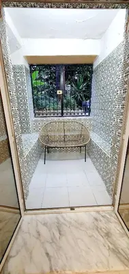 a room with a bench in the middle of a building at Appartement 3 pièces sur Nice Centre in Nice