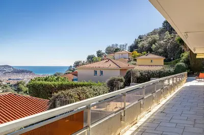 a view from the balcony of a house at Bay of Angels by ecoflats in Nice