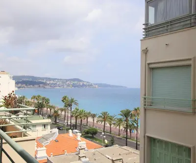 a view of the ocean from a building at Happyfew Le Miramar in Nice
