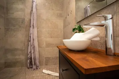 a bathroom with a sink and a shower at Garibaldi AP4447 By Riviera Holiday Homes in Nice