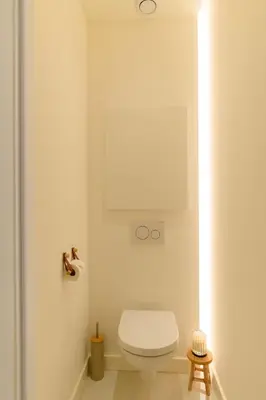 a bathroom with a white toilet in a room at Hyper Centre, balcon, 5min de la plage, AC in Nice