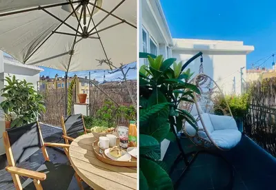 a patio with a table and an umbrella at Nestor&Jeeves - TERRASSE DU SUD - Central - Terrace in Nice
