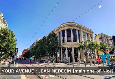 a large building on a city street with the words your avenue jensen melbeck at Nestor&Jeeves - KORNER AVENUE TERRASSE - Central - Balcony in Nice