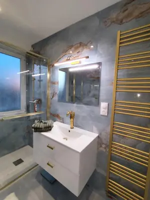 a bathroom with a sink and a shower at Cozy appartment downtown Nizza 2 Bedroom 1 min Beach 1 min tramway 10min airport air conditionner in Nice
