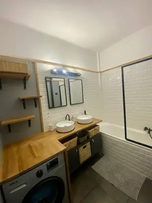 a bathroom with two sinks and a washing machine at Nice Ouest Caucade- Beautiful 2P, AC, Clim in Nice