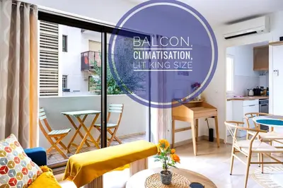 a living room with a couch and a table at Rivoli- Quiet apartment, close to Negresco in Nice