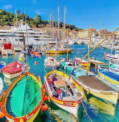 a group of boats docked in a harbor at Pleasant central apartment with balcony in Nice