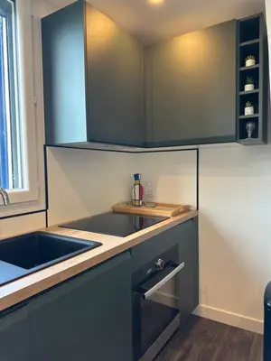 a kitchen with a sink and a counter top at Gîte Le Tilleul in Aspremont