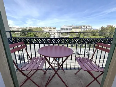 a purple table and two chairs on a balcony at ApartHotel riviera - Balcon Jean Jaures 2 - Place Massena - Old in Nice