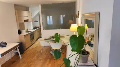 a kitchen with a table and a dining room at Beach Proximity in Historic Nice, Your Perfect 2 Room Rental in Nice