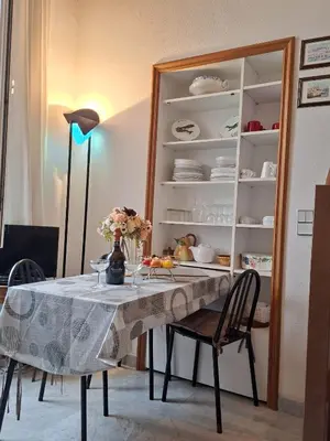 a kitchen with a stove top with a sink at MARINE AP4445 By Riviera Holiday Homes in Villefranche-sur-Mer
