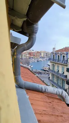 a pipe on the roof of a building at cozy apartment port of Nice in Nice