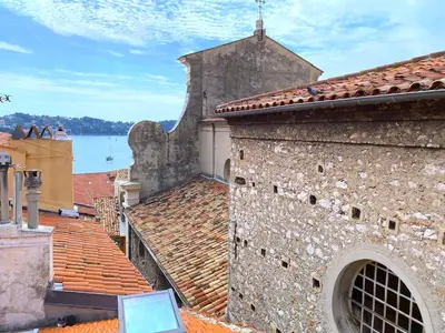a view from the roof of an old building at PERCHOIR AP4443 By Riviera Holiday Homes in Villefranche-sur-Mer
