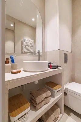 a bathroom with a sink and a toilet at Maison Galbani Architect-designed apartment in Nice