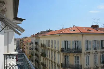 a view from a balcony of buildings at Top floor appartement - central in Nice