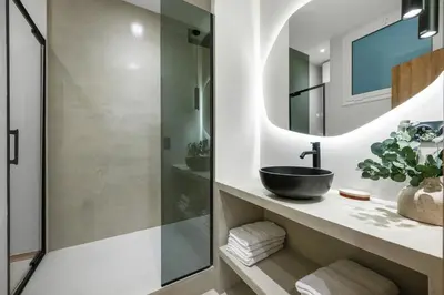 a bathroom with a sink and a shower at Beautiful apartment, old nice in Nice