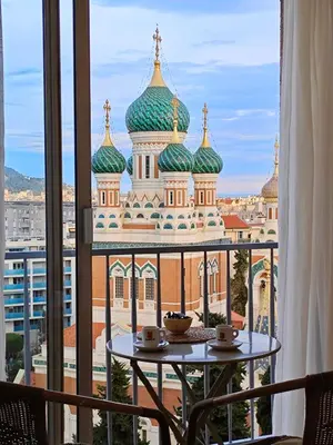 a view of a church from a window at 3P 72m2 Climatisé Vue exceptionnelle Cathédrale St Nicolas et Mer in Nice