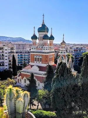 a large building with domes on top of it at 3P 72m2 Climatisé Vue exceptionnelle Cathédrale St Nicolas et Mer in Nice