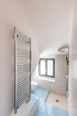 a bathroom with a shower and a toilet at Villa Margot ' Exceptional Place in Villefranche-sur-Mer