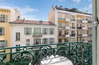 a view of a building from a balcony at Studio Jaune FSHH in Nice