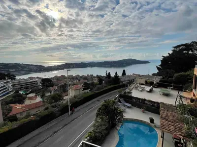arial view of a city with a view of the water at Bas de villa plus piscine Vue époustouflante in Villefranche-sur-Mer
