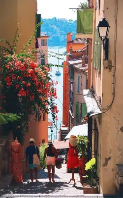 a bedroom with a bed with a blue ribbon on it at Nice - Beautiful bright apartment - 10 min beach in Nice