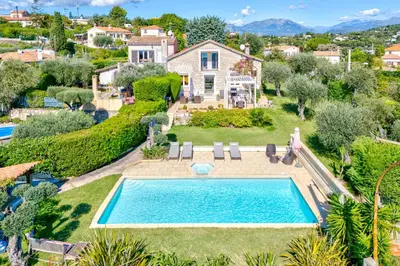 an aerial view of a house with a swimming pool at Villa de prestige Vue mer panoramique Piscine Climatisation in Nice