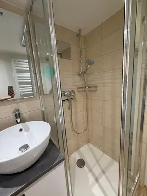 a bathroom with a sink and a shower at Studio Sunrise - Jean Médecin in Nice